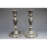 A pair of early Georgian influenced electroplate candle sticks, 19 cm