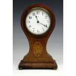 A Reid walnut balloon clock, 23 cm