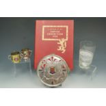 A group of 'Empire Exhibition 1938' commemoratives comprising of a book, an enameled whiskey