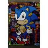 Two 1990s Sega / TSB Sonic the Hedgehog posters and a 2000 Doctor Moose "Hard Core Pawn" poster