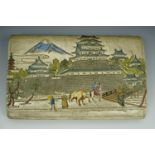 A vintage Japanese faux leather clutch handbag, decorated in a polychrome depiction of a fortress