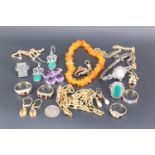 A group of vintage and later costume jewellery including an amber bracelet and a marcasite and