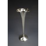 A late Victorian silver bud or specimen vase, of slender trumpet form with a cusped and beaded