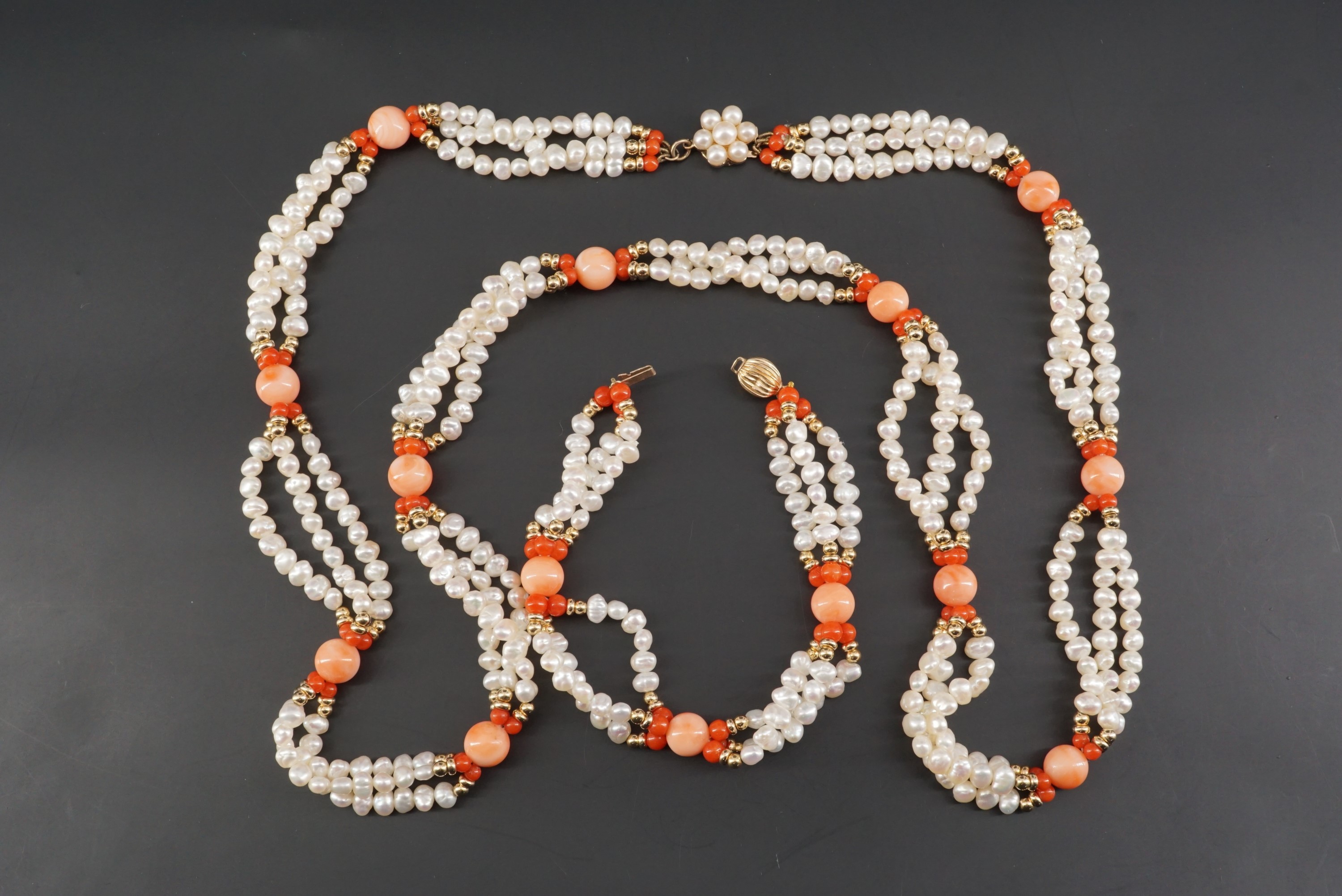 A contemporary fresh water pearl, coral and 9 ct gold demi parure, comprising a necklace and