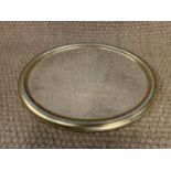 An oval antiqued gilt framed wall mirror, 58 cm x 48 cm