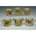 An assortment of Royal Worcester blush ivory porcelain miniatures, comprising a tyg, a pair of