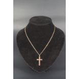 A 9 ct yellow metal pendant cross and 9 ct gold fine fetter and curb link neck chain, 30 mm, 44