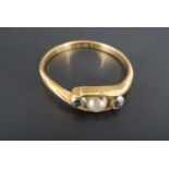 A vintage 18 ct yellow metal, twist set pearl and white stone ring, set on 18 ct yellow metal, Q/