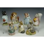 Seven Beswick Beatrix Potter figurines including owls, tallest 10 cm