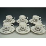 A set of six Royal Worcester coffee cans with saucers