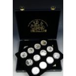 A "The Historic Coins of Great Britain" case with 18 one ounce fine silver coins
