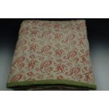 A late 19th / early 20th Century printed Paisley pattern quilted cotton bed spread