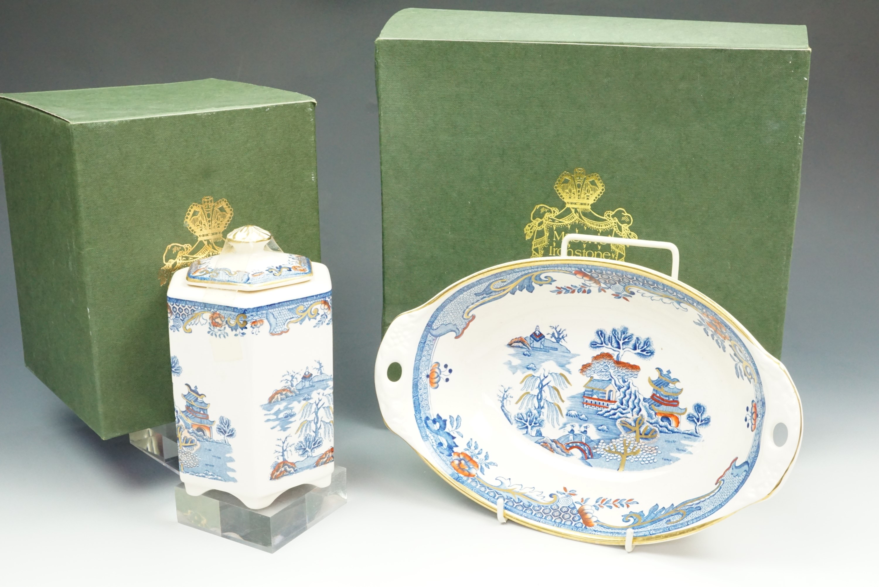Two boxed Mason's 'Gold Willow' pieces, an oval bowl and a tea caddy.
