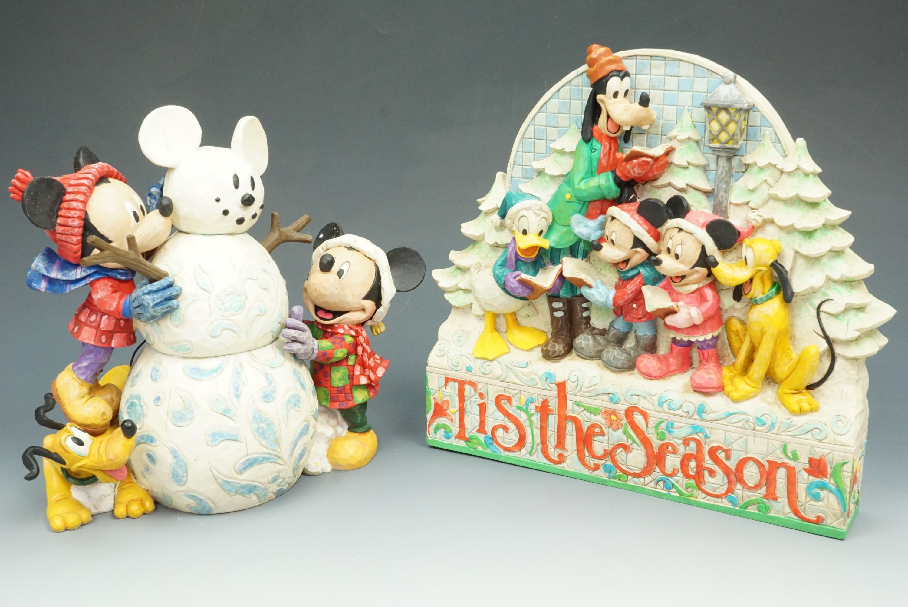 Two boxed Enesco 'Walt Disney Collection' pieces, 'Magic Comes in Many Shapes' and 'T'is the Season'