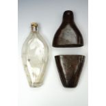 A Victorian leather-covered glass hip flask, 15 cm