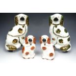 Pair of Victorian fireside spaniels and a smaller late 20th century pair, larger pair 21.5 cm high.