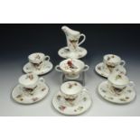 A Royal Doulton transfer printed part coffee set