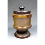 A Victorian turned yew tobacco jar with conforming turned ebony lid, 19 cm