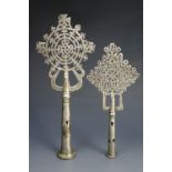 Two white metal Ethiopian Coptic Christian processional crosses, cast with pierced design, tallest