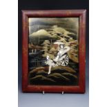 A 1920s Japanese Shibayama and maki-e lacquer plaque depicting a woman being transported by