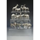 Twelve electroplate animal figurines including lion, elephant, camel etc, tallest 8 cm