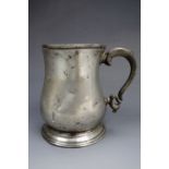 A Victorian pewter baluster pint tankard, its base engraved "W Brown, Tunbridge Wells"