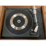 A 1960s Garrard SP25 record turntable, in mahogany veneered case, 45 cm x 37.5 cm x 24 cm