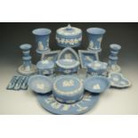 A quantity of Wedgwood Jasperware including a plate, lidded boxes, pair of candlesticks etc