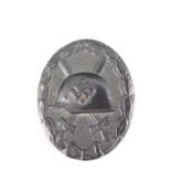 A German Third Reich wound badge in black, marked L/16