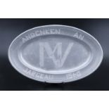 A 1940 German POW Camp Jargeau France engraved aluminium mess dish, 30 cm x 19 cm