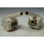 A pair of Great War "Porcelle" crested china artillery pieces, bearing the arms of the city of