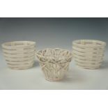 A pair of 19th century creamware baskets, six sided with horizontal strap-work and a basket with