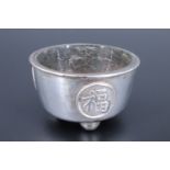 A Canton or Hong Kong sterling white metal salt cellar, decorated with circular plaques bearing