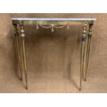 A Hollywood Regency white marbled topped gilt metal side or hall table, 105 cm x 30 cm x 90 cm