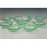 A pressed green glass dessert set