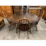 Five Ercol Windsor dining chairs and a drop-leaf table