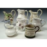 Eight 19th century and later jugs, comprising Victorian with moulded decoration and transfer