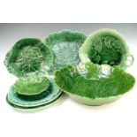 A 19th century Wedgwood green leaf-moulded majolica serving plate, luncheon plate, three 19th