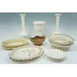 18th and 19th century creamware comprising candlesticks, a cachepot, bowls, and plates, (all a/f)