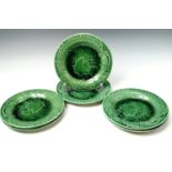A set of six late Victorian green leaf-moulded majolica plates