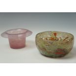 An end of day glass bowl, bulbous sides formed from clear and coloured glass, 12 cm dia and a pink