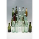 A quantity of Victorian and later Codd patent and other glass bottles