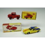 A boxed Dinky 255 Mersey tunnel police van together with a boxed Dinky 218 Lotus Europa
