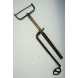 A Second World War Home Front Civil Defence stirrup pump, 21 cm