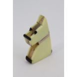 A vintage novelty Art Deco influenced Lucite cigarette lighter modelled as a Scottie dog, circa