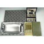 A boxed Chichester stainless steel dish together with boxed knives and pastry forks