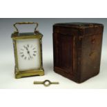 A late 19th / early 20th Century French champleve enamelled carriage clock, cased, 11 cm excluding