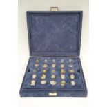 A cased Mayfair "Authentic US Police Badge Collection" of miniature badges