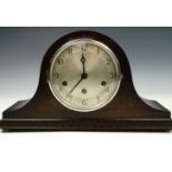 An oak Napoleon hat mantle clock with Mauthe movement, clock face 15 cm diameter
