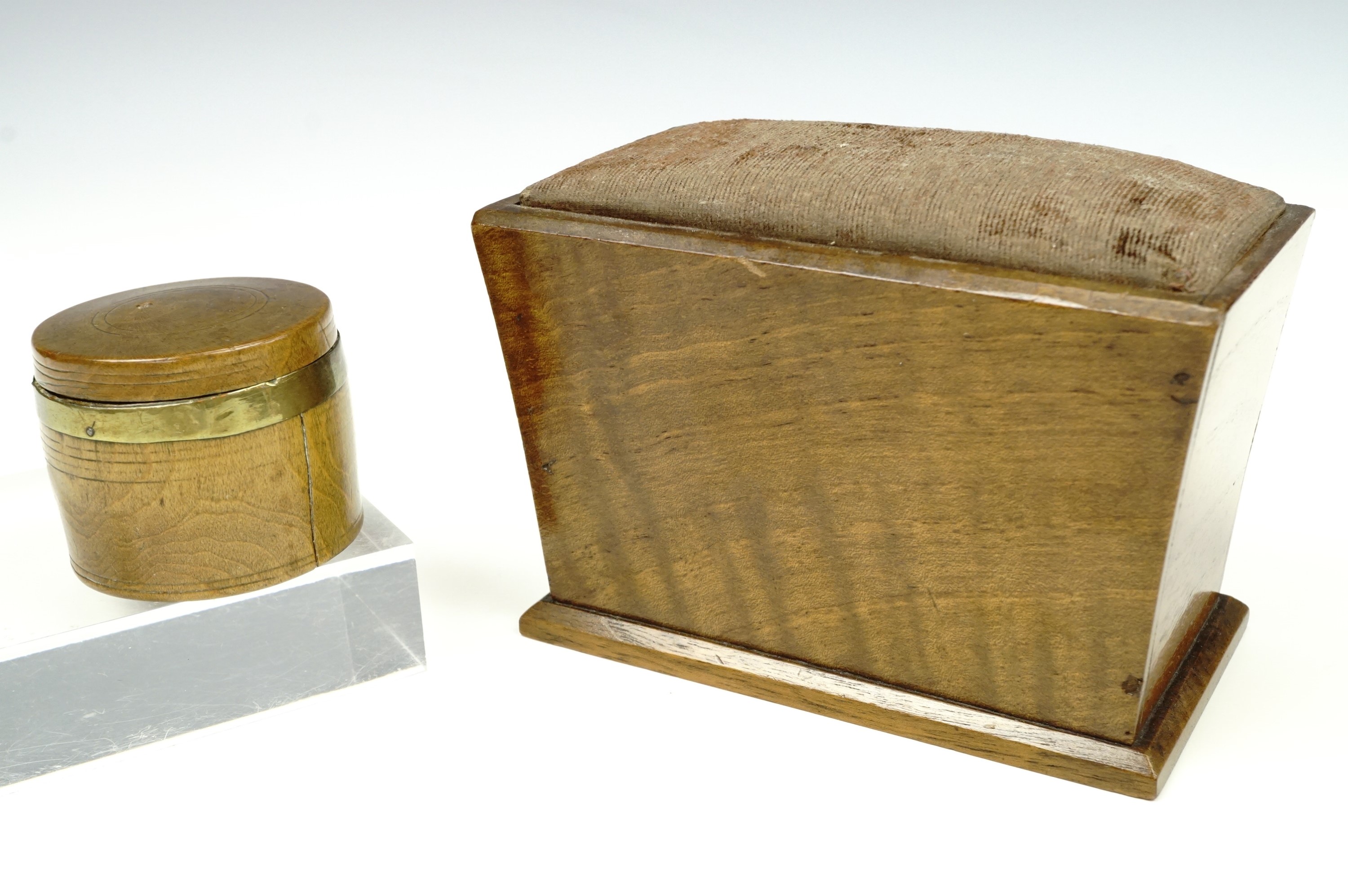 A small Victorian sarcophagus-form walnut pin cushion / sewing box, together with a brass banded